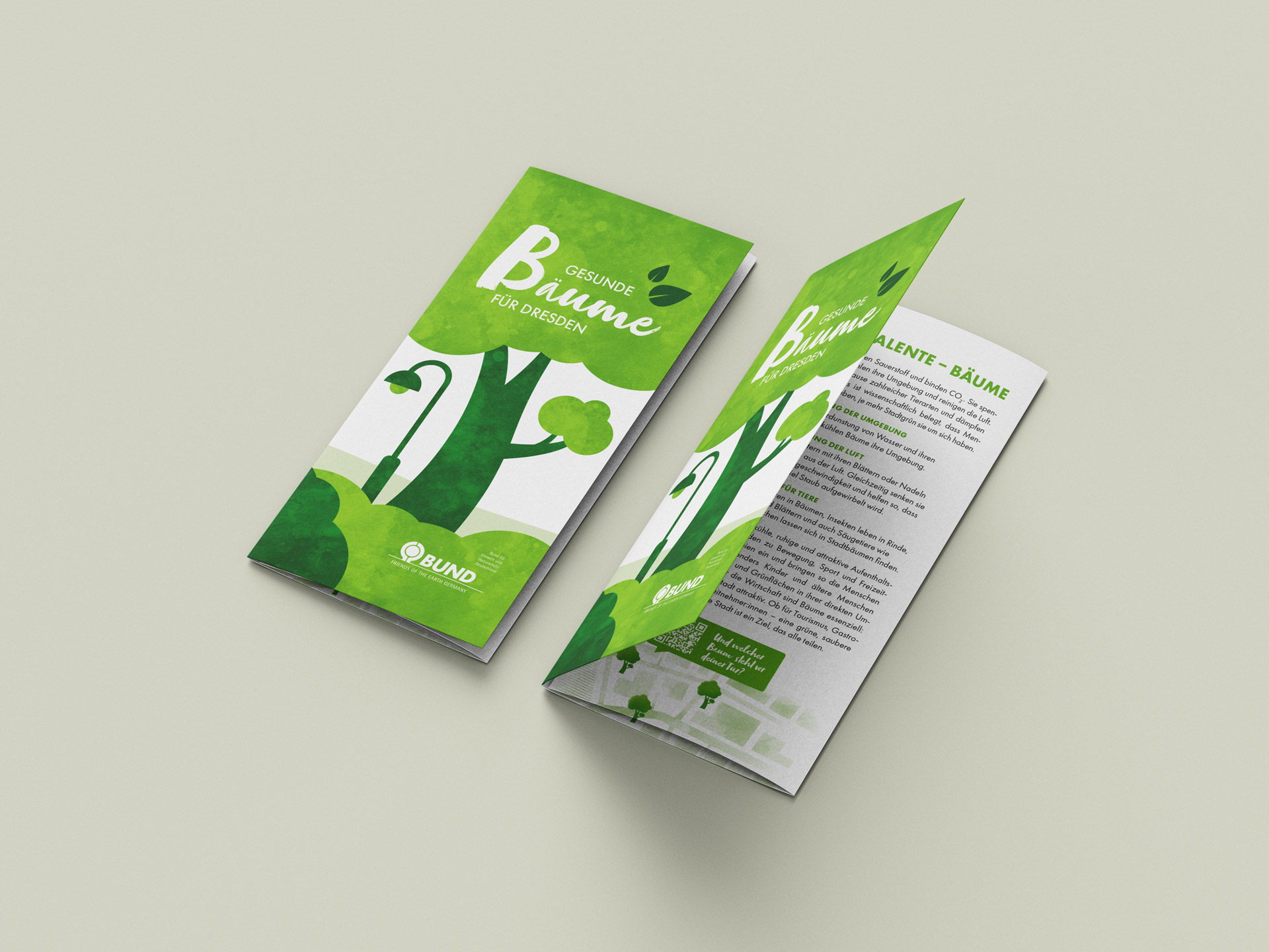 Faltblatt mit dem Titel 'Gesunde Bäume für Dresden' vom BUND, zeigt stilisierte grüne Bäume und Informationen zu Baumpflege